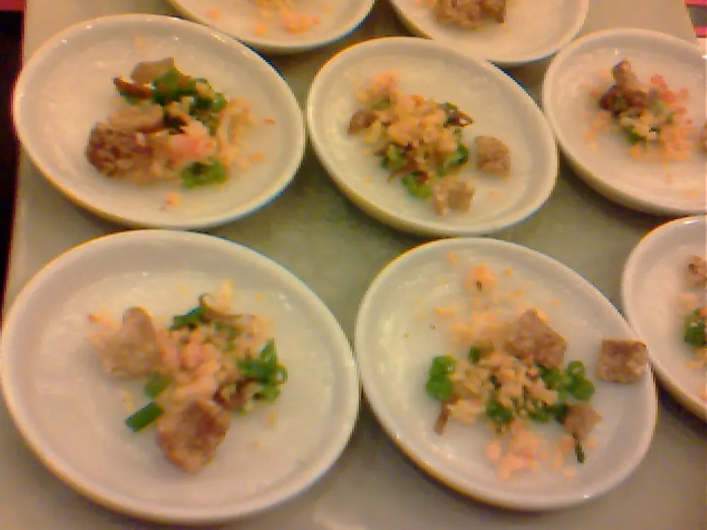 Bánh bèo — small steamed rice cakes in dishes, topped with dried shrimp and scallion oil