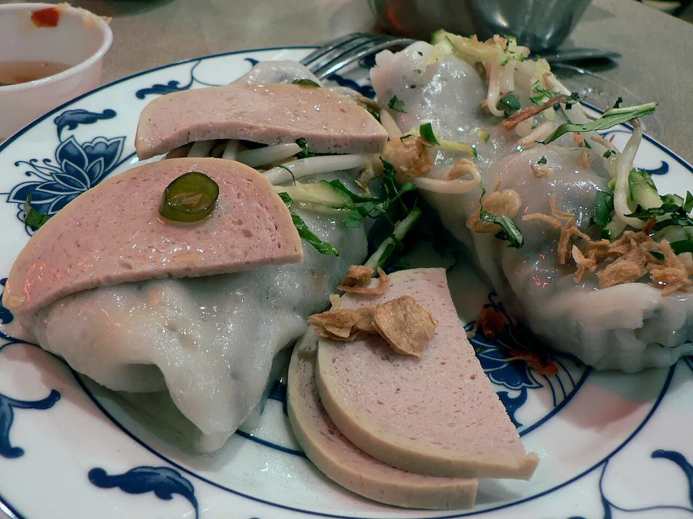 Bánh cuốn — steamed rice rolls with pork sausage and fried shallots