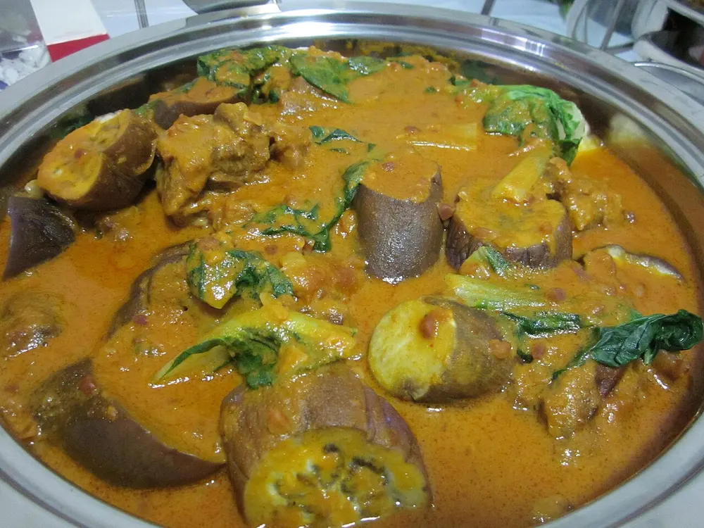 Kare-kare — oxtail and vegetables in a thick peanut sauce