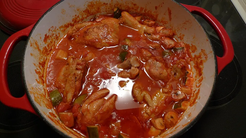 Pollo alla cacciatora — hunter's chicken braised in a tomato sauce