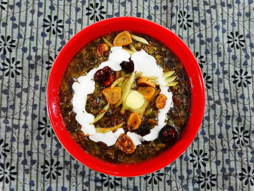 Dal makhani — black lentils and kidney beans simmered with butter and cream