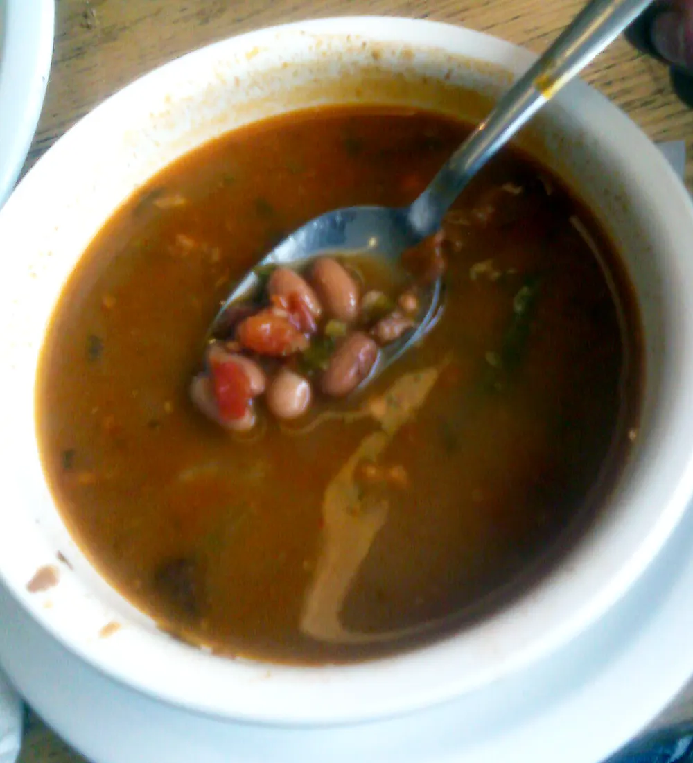 Frijoles charros — brothy pinto beans with tomato and chili