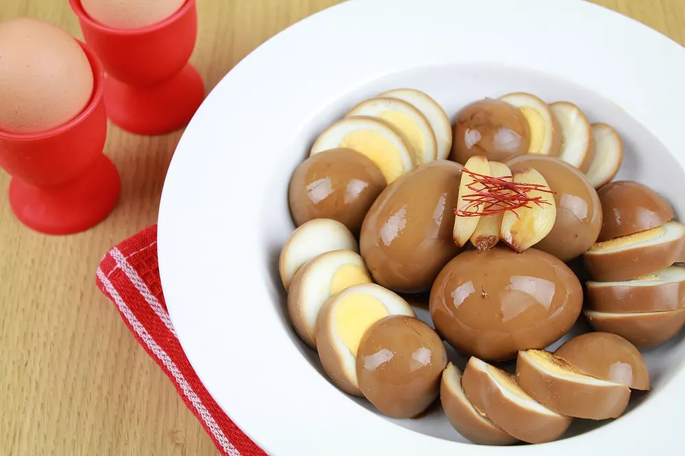 Gyeranjang — eggs marinated in soy sauce, halved to show the jammy yolk