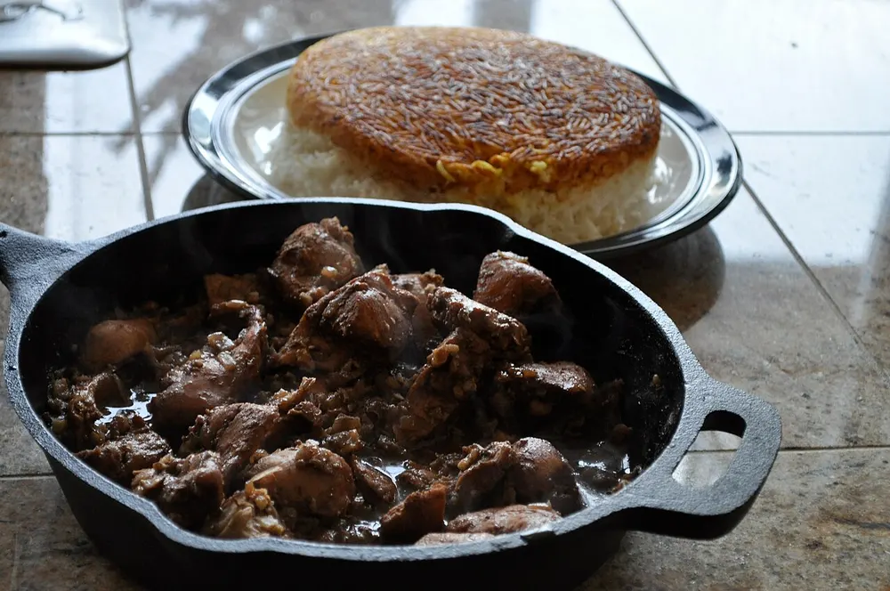 Khoresh fesenjan — chicken in a walnut and pomegranate sauce
