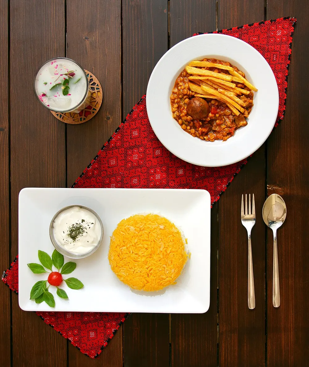 Khoresh gheimeh — split-pea and lamb stew topped with fried potato straws