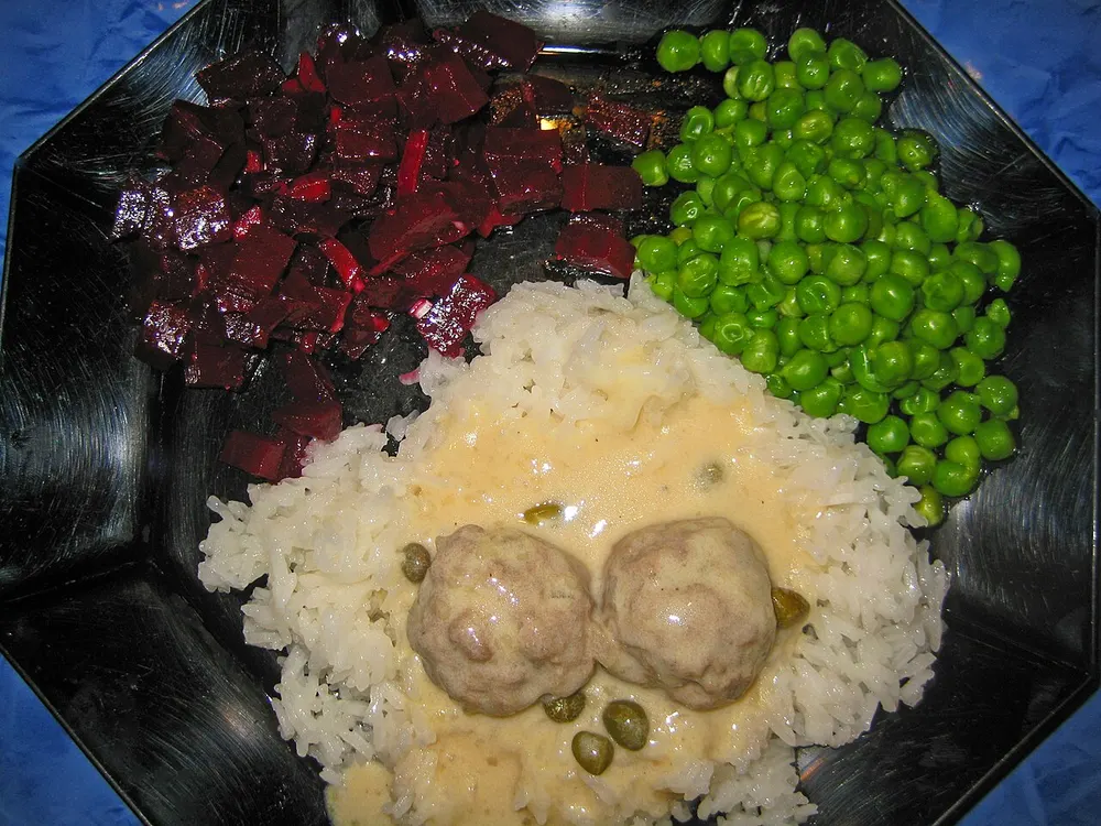 Königsberger Klopse — meatballs in a white caper-cream sauce over rice