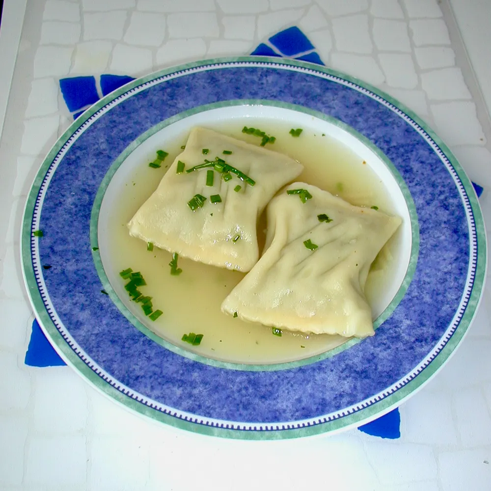 Maultaschen — large Swabian filled pasta pockets served in clear broth