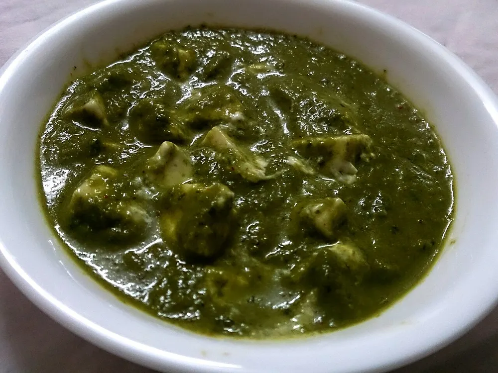 Palak paneer — paneer cheese cubes in a spiced spinach purée