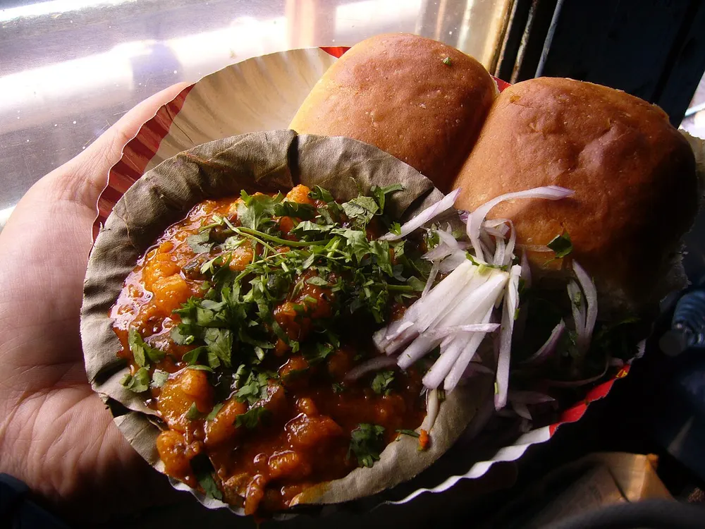 Pav bhaji — spiced mashed-vegetable curry with buttered bread rolls