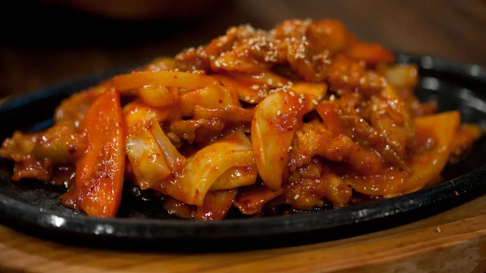 Spicy stir-fried pork jeyuk-bokkeum with onions and chili