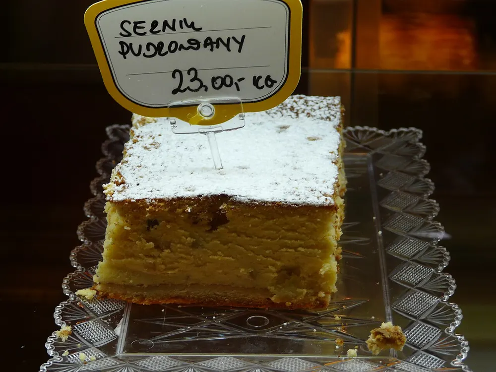 Sernik — Polish baked cheesecake dusted with icing sugar