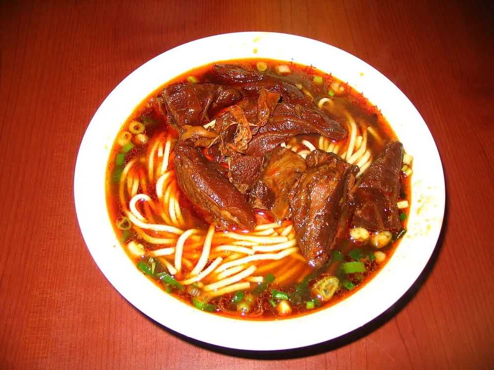 Taiwanese beef noodle soup — red-braised beef and noodles in a rich broth