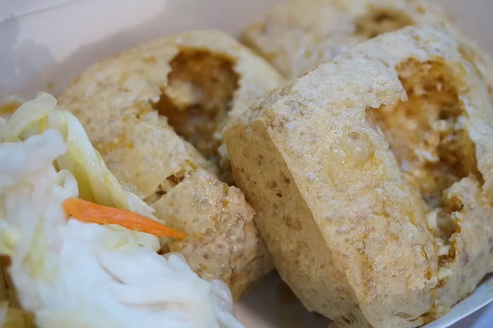 Fried stinky tofu — deep-fried fermented tofu with pickled cabbage