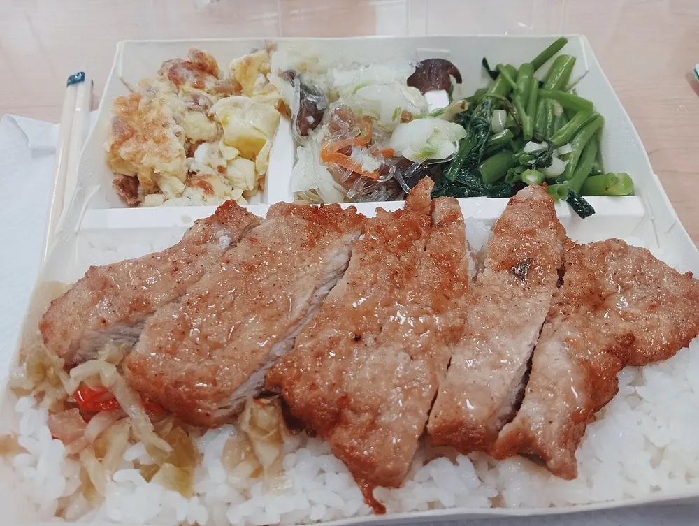 Paigu fan — fried pork chop over rice in a Taiwanese railway-style bento