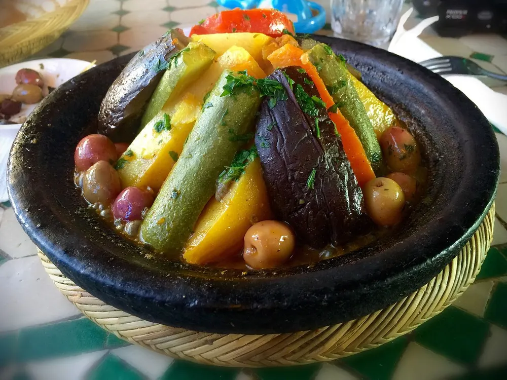 Vegetable tagine — steam-cooked vegetables mounded in a conical clay pot