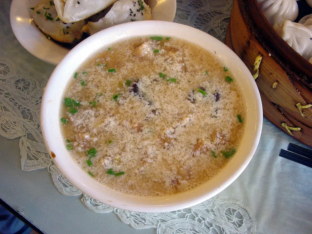 Xian doujiang — savoury soy milk soup with youtiao, dried shrimp and scallion