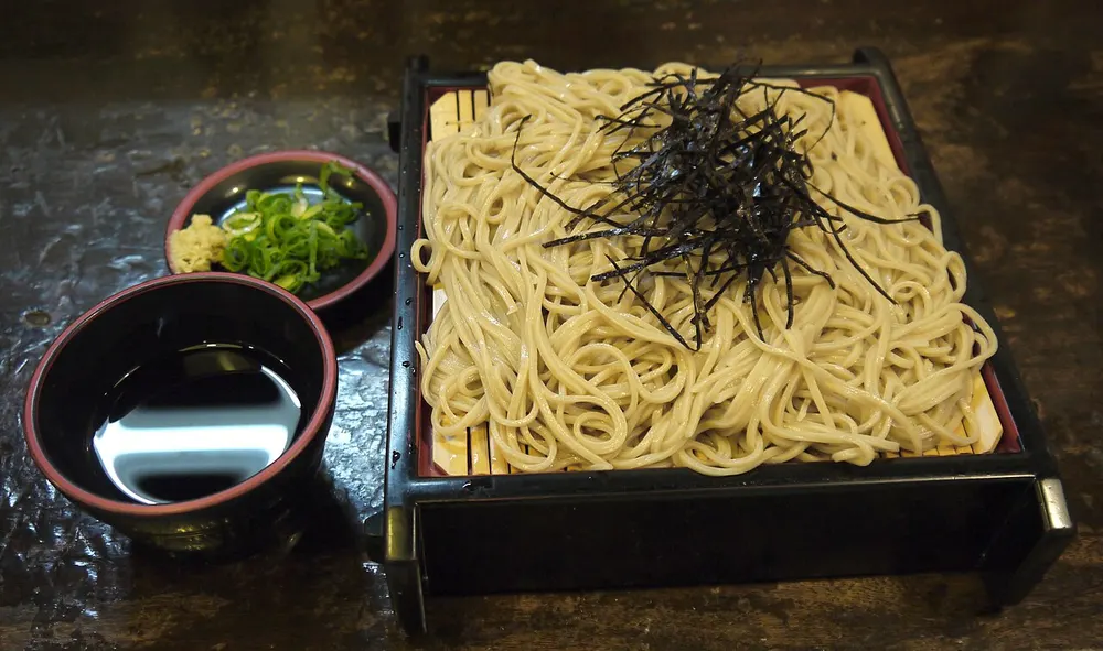 Cold zaru soba on a bamboo tray with nori